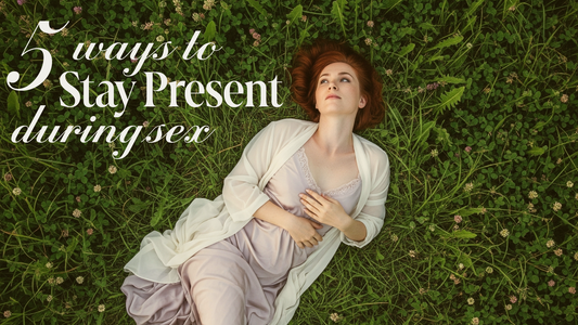 woman laying in grass day dreaming with lavender slip on 6 ways to stay present during sex