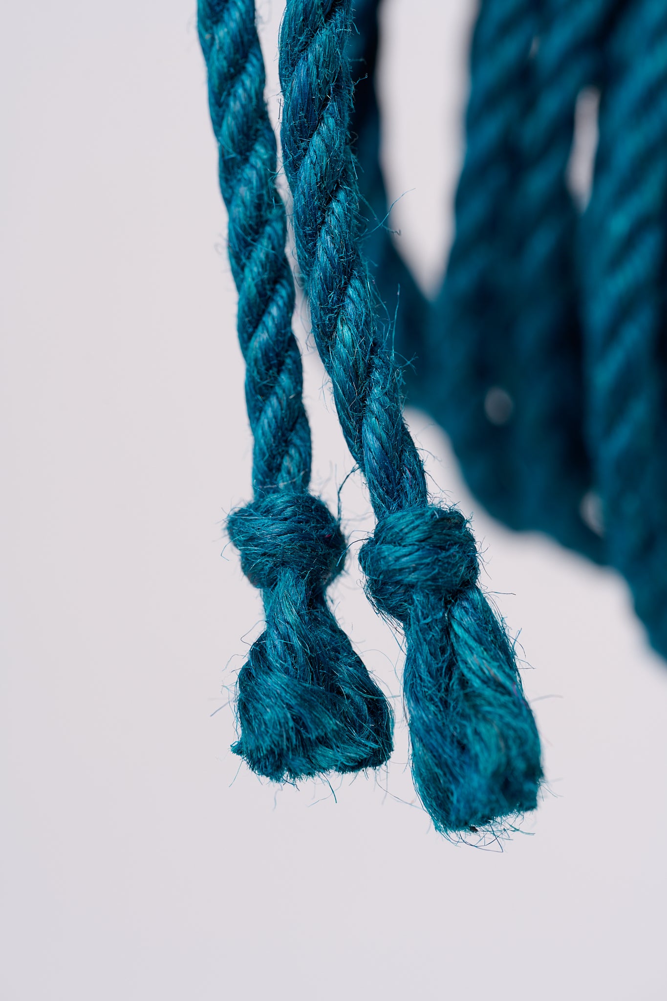 Blue Lovey Subby shibari Jute rope walker knotted ends.
