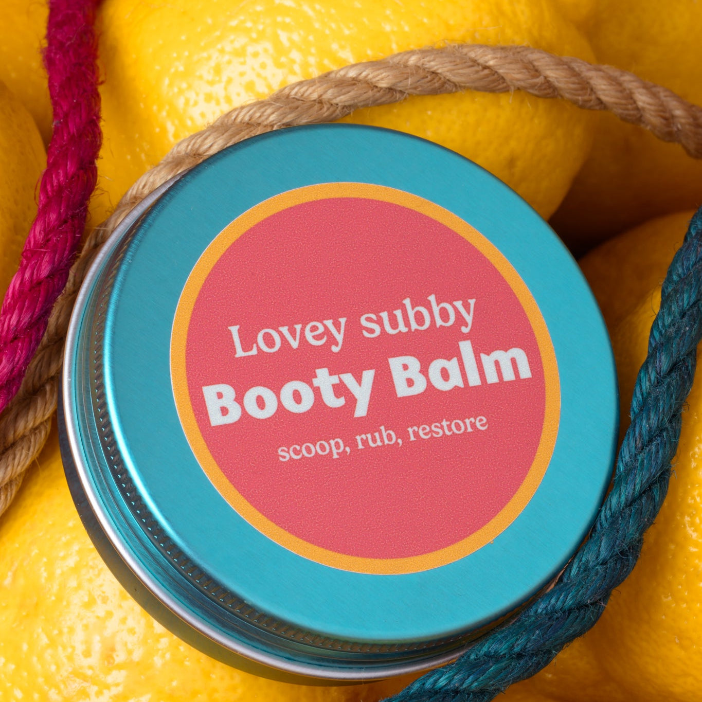 lovey subby booty balm blue tin on lemons  with jute rope