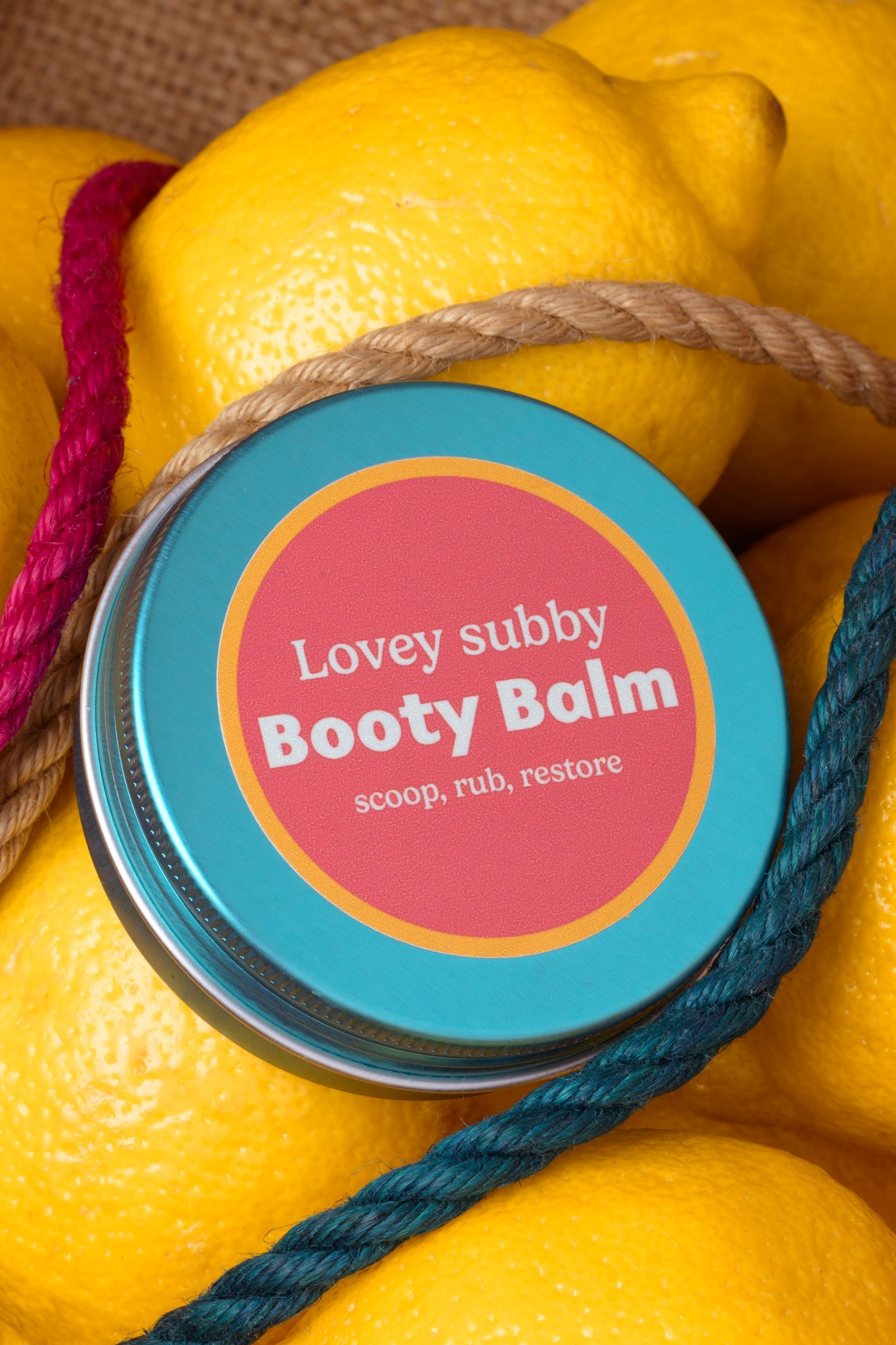 lovey subby booty balm blue tin on lemons  with jute rope